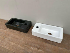 Small WALL HUNG Matte White Basin vanity powder w Black pop up plug bottle trap