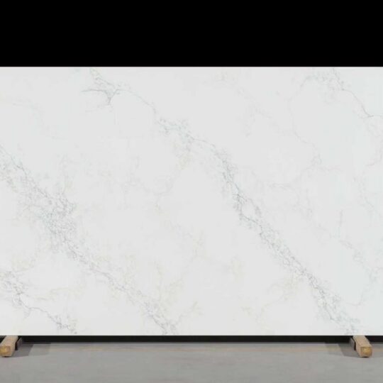 Golden Silk engineered stone slab with delicate grey veining, premium zero-silica surfacing material.