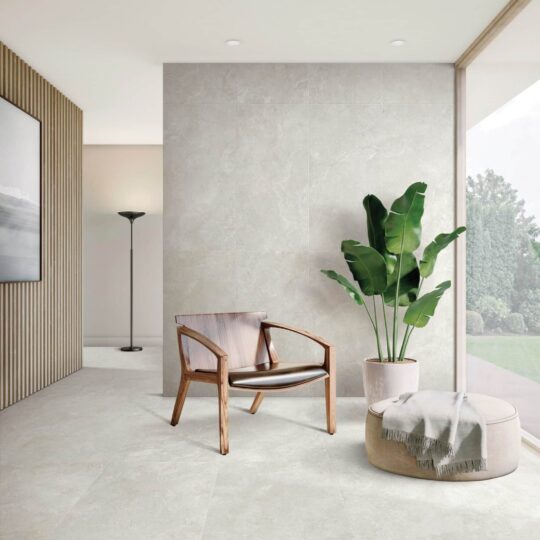 Espera Ivory Carving Glaze Porcelain Tile flooring in a modern interior design.