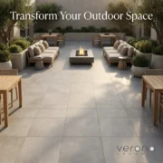 Outdoor space transformed with grey porcelain tiles and modern outdoor furniture.