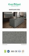 Anatolian Steel engineered stone slab with leathered surface in a modern kitchen setting.