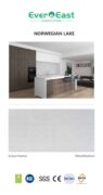 Modern kitchen interior with engineered stone island and timber cabinetry.