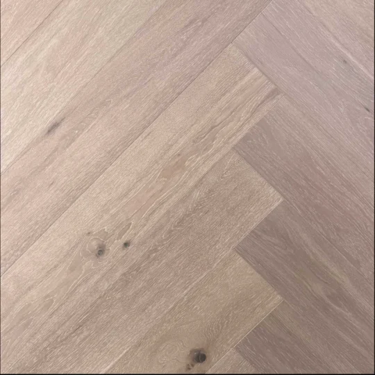 European Oak engineered herringbone flooring, textured wood grain detail