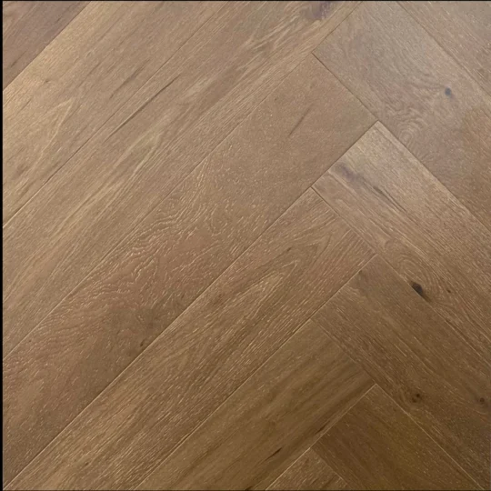 Dull Gold Engineered European Oak Flooring with Matt Brushed finish, herringbone pattern.