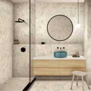 Middle Grey Stone Look Porcelain Tile bathroom installation with vanity and shower.